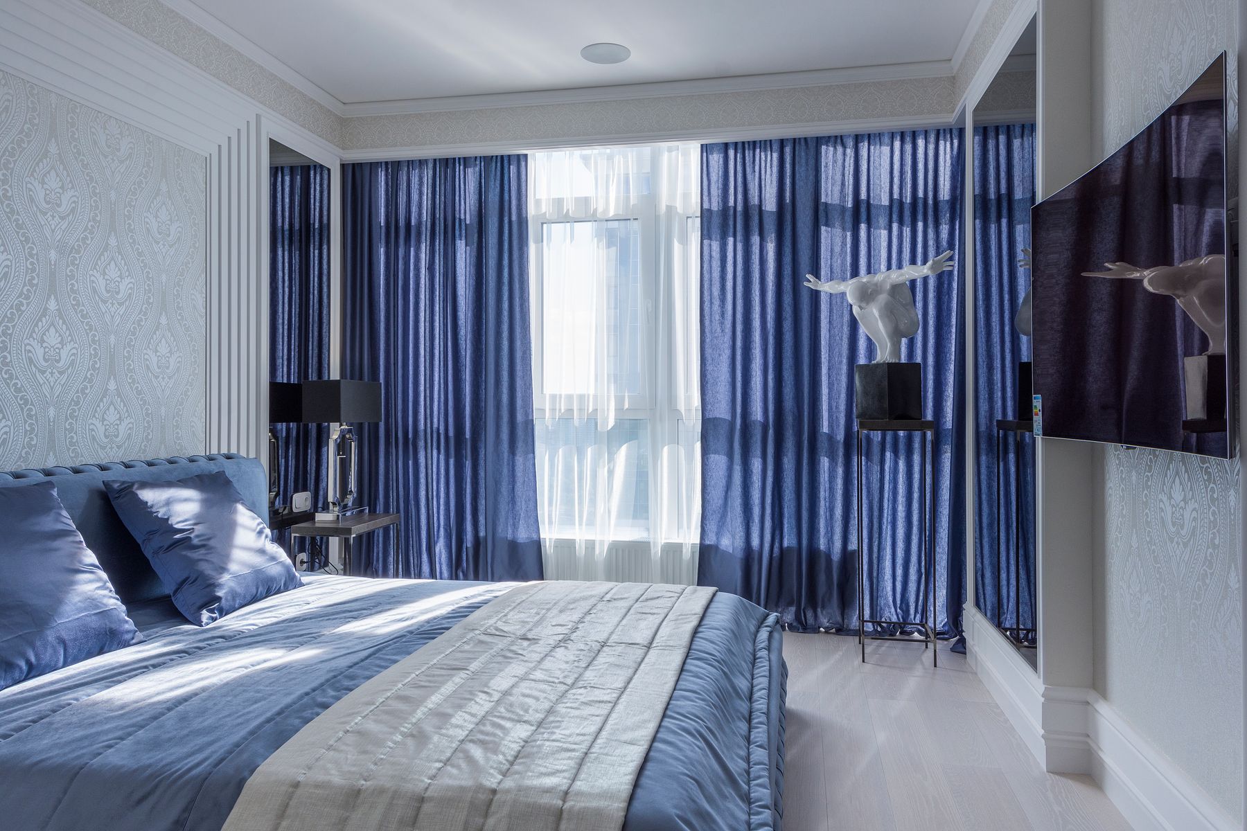 Wallpapered bedroom showing how material changes a room